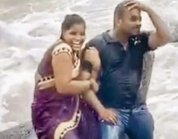 While taking the picture, the woman was swept away by the sea wave. The video went viral
