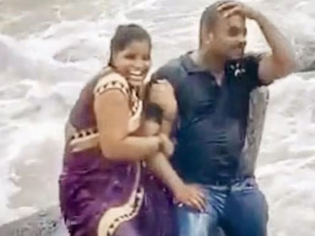 While taking the picture, the woman was swept away by the sea wave. The video went viral