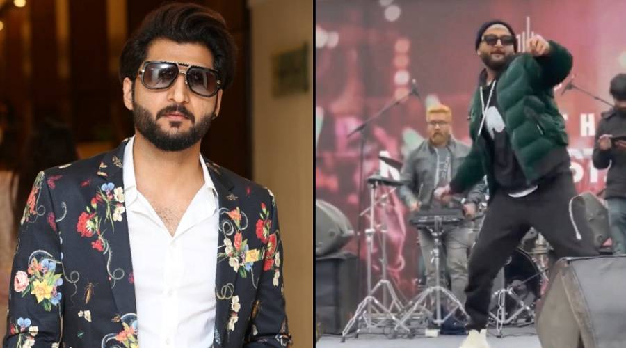 Singer Bilal Saeed hit fans with the mic during a concert in Phalia.